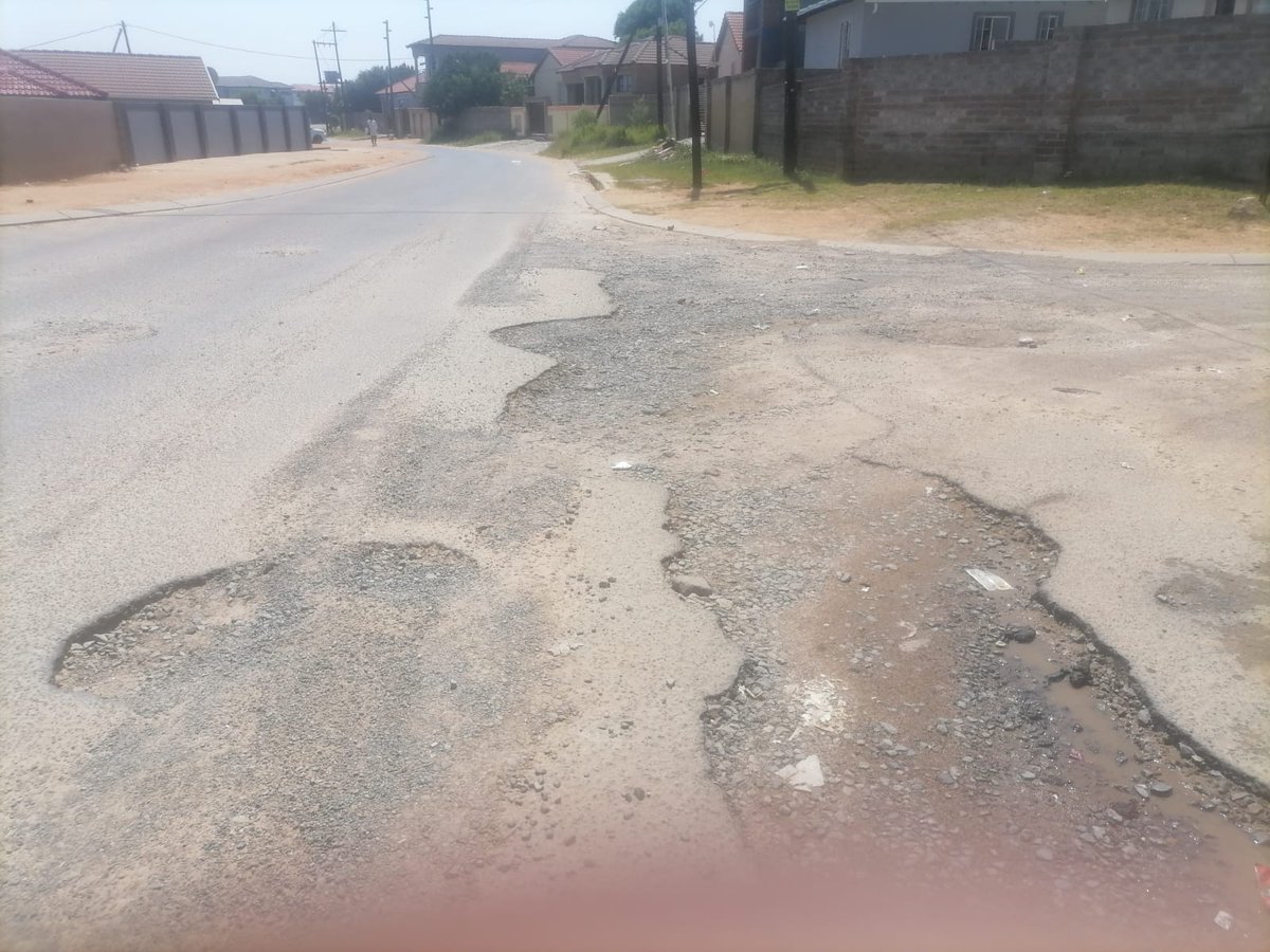 Seathane's tweet photo. @jra 

Good afternoon.
Please assist with potholes in Laso and Philippines Crescent in Cosmo City Ex8.
Attached please see how damaged the streets are. https://t.co/Sizbpozop7
