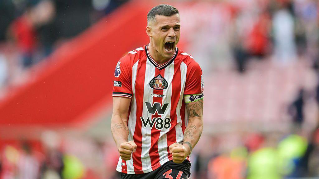 SkySports_Keith's tweet photo. 🚨 🇨🇭 Granit Xhaka has trained all week and is back in the Sunderland squad to face Fulham on Sunday. 
❌ 🇲🇿 However, Reinildo will miss the next 4 weeks having injured his knee #SAFC https://t.co/crOZa8ddMq