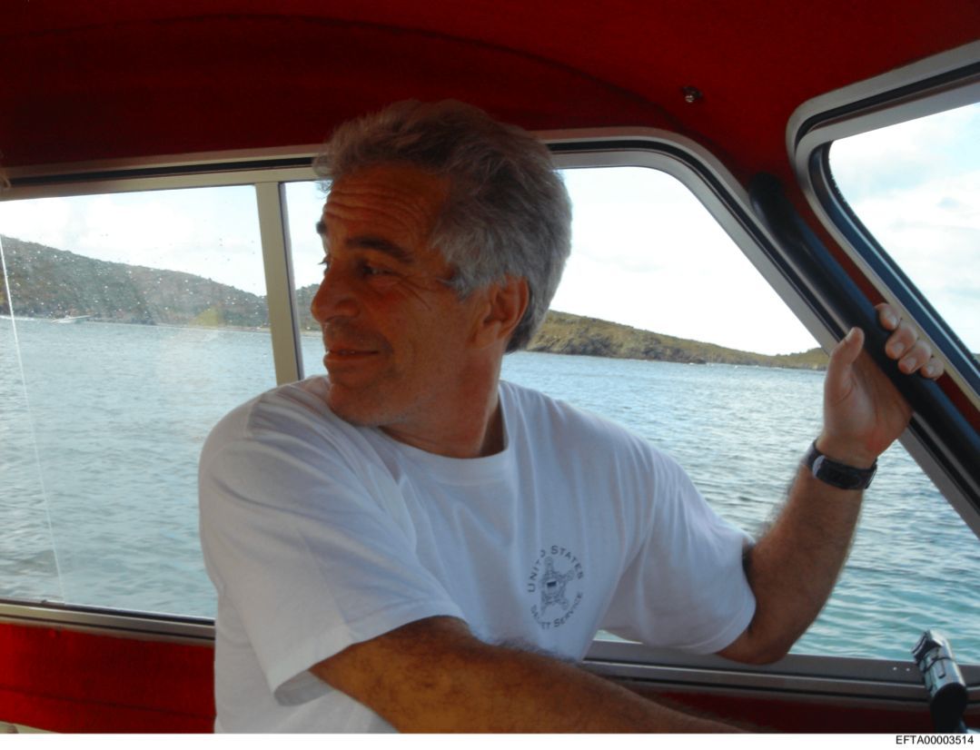 OunkaOnX's tweet image. Epstein is seen wearing a United States Secret Service shirt in recently released files