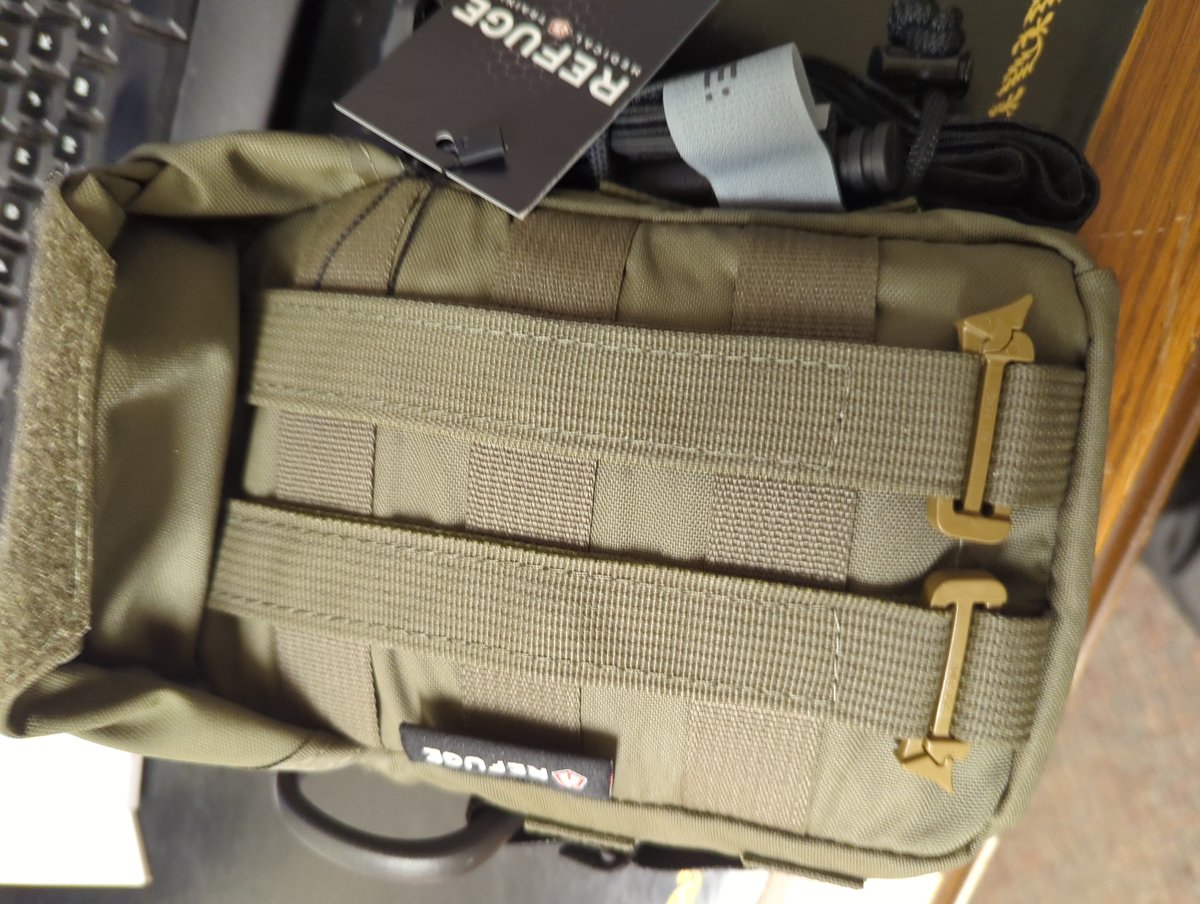 The kit comes in a molle pouch with straps for mounting to whatever you need. Exterior is robust and tightly packed. A CAT is mounted with an elastic band and comes sealed. I always open mine so I don't have to fumble with it if it is needed in a hurry. 3/