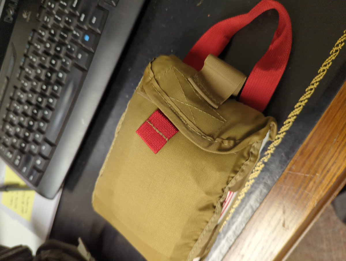 The kit is supremely well organized in an inner pouch w/ each component retained. The inner pouch has a red webbing strap for yanking it out easily in poor conditions and opens flat for easy access. The pull-out pouch is hugely important. No fishing in the dark for your stuff 7/