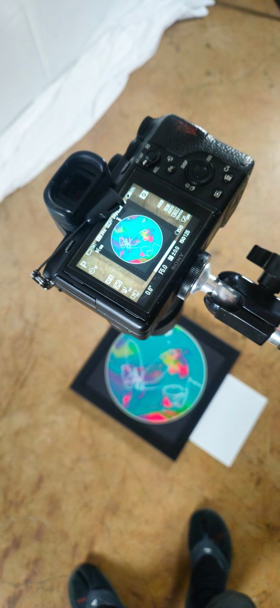 redideo_art's tweet photo. 📸 Alien Slushie getting prepped for the store. Volume 2 vinyl record mixed media. White paper = quick color-balance reference. https://t.co/326OT1lRQV