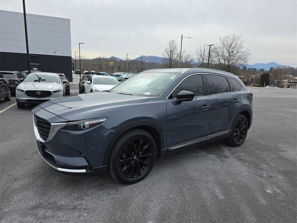 Certified 2023 Mazda CX-9 Carbon Edition AWD with red leather