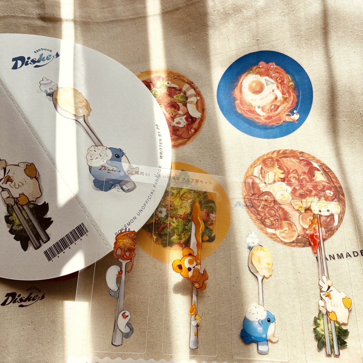 一部届いた！新刊のお皿にクリアしおりを置いてカトラリーみたいにし