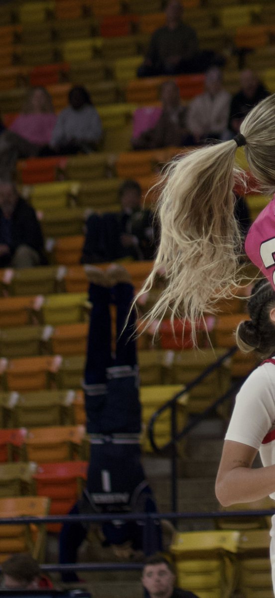 Pshark14's tweet photo. I can’t believe I missed this at first, but I’m so glad I eventually noticed that in the background of Elise Livingston obliterating a defender, Big Blue has decided that a handstand is the optimal viewing angle for Aggie hoops. https://t.co/L6KqFpDbID