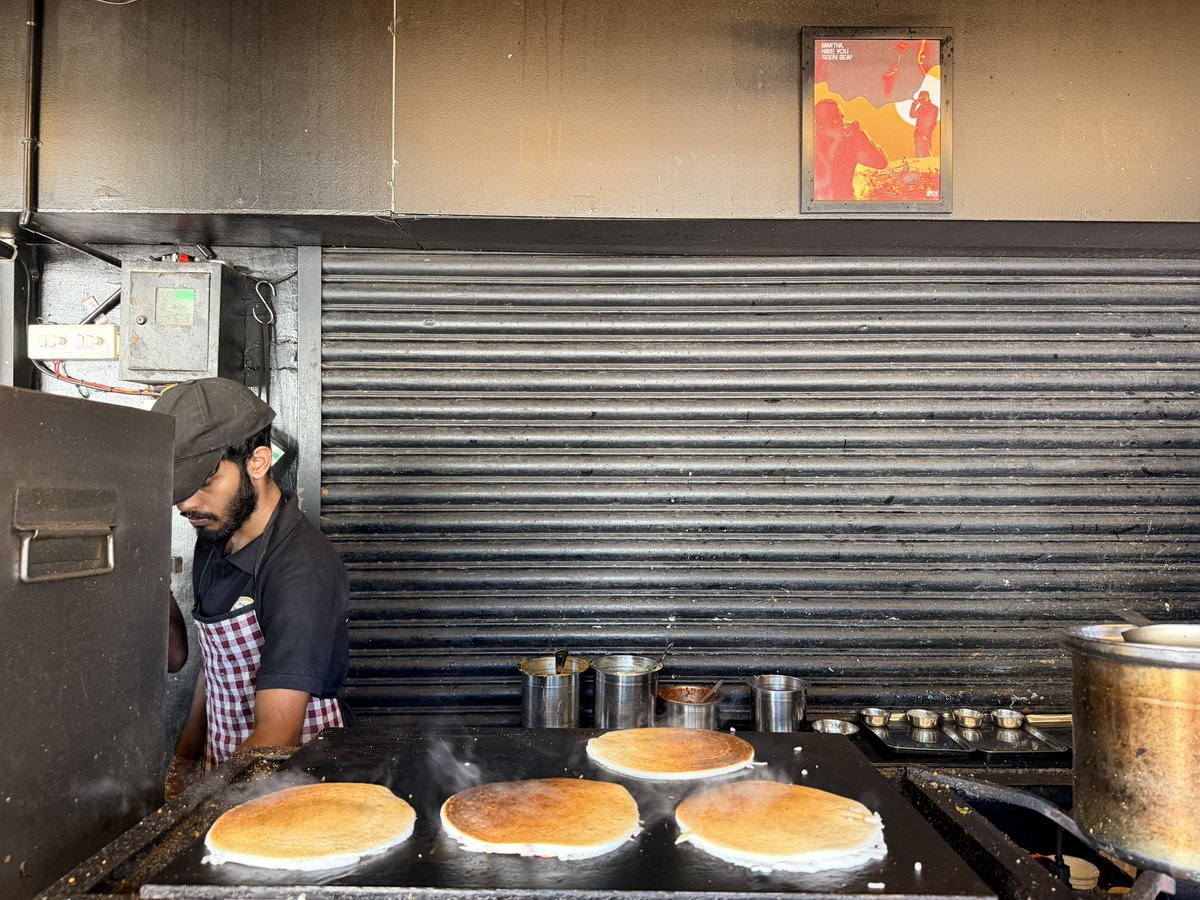 Was looking for a good South Indian breakfast in Varkala, just the idly, dosa type.  Stumbled upon this tiny eatery called Tickety Boo.

Small place. Limited menu still fully packed. 

And then I noticed something, the entire team of four runs this place without being able to