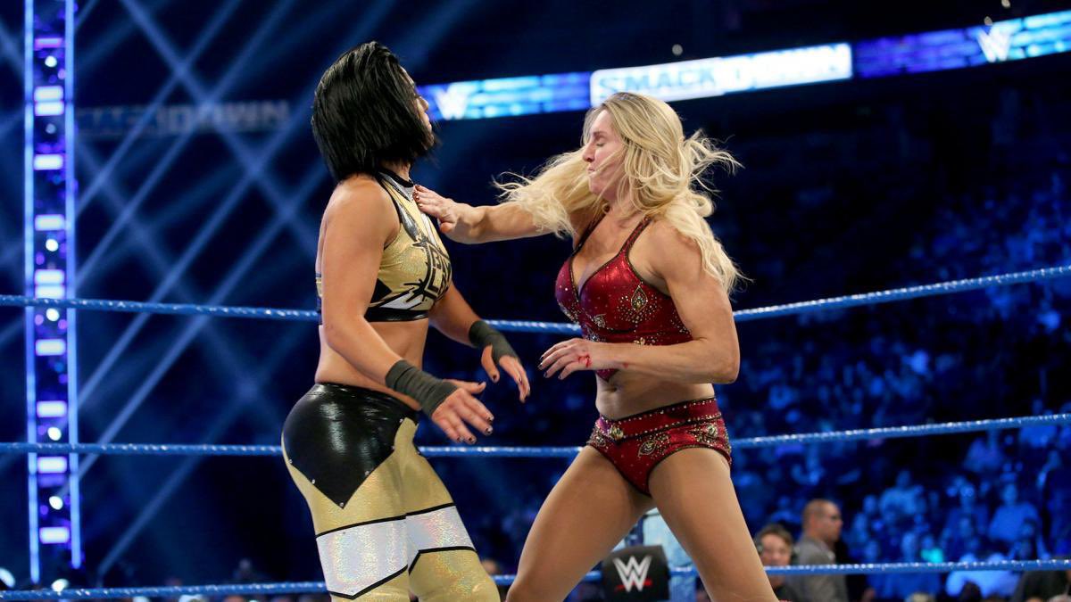 S2lWrestling's tweet image. Chelsea stuns Nikki with a Rough Ryder, but Charlotte @aescado blasts both with chops and a Big Boot!! 

Nikki fires back with a Bella Buster on Chelsea and nearly steals it!!
