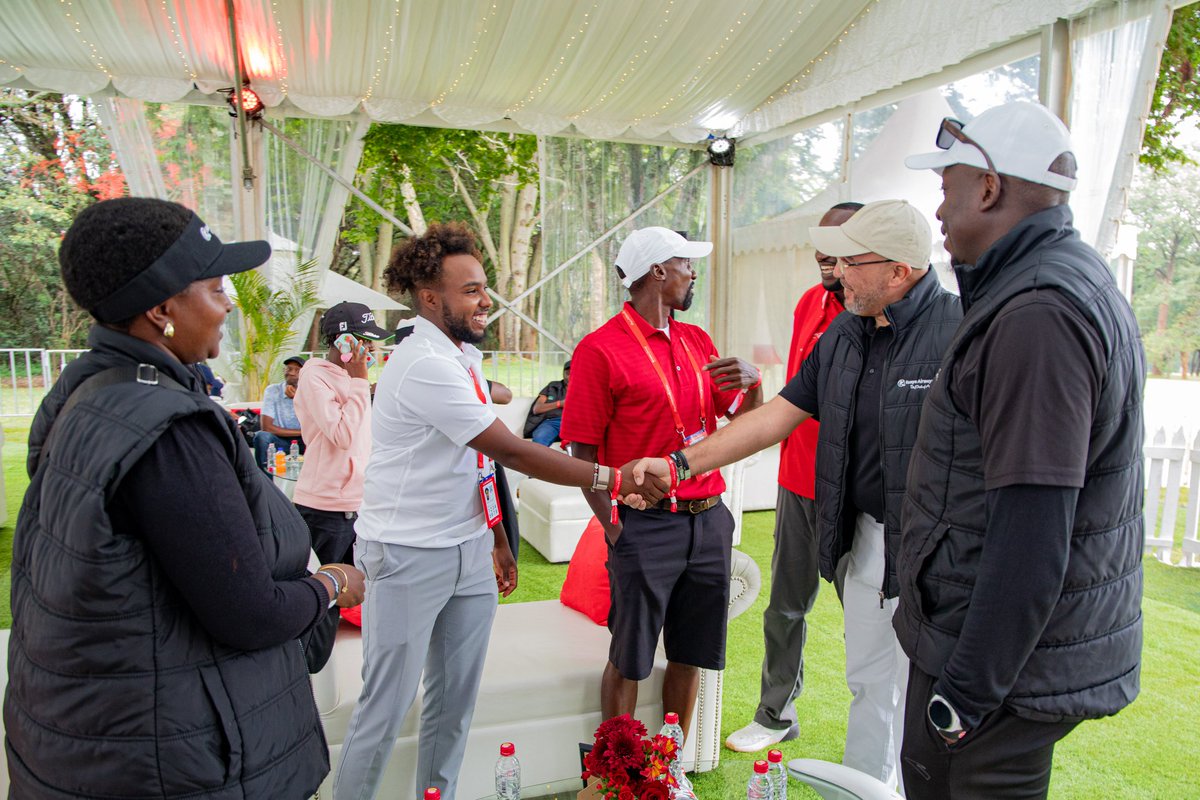 KenyaAirways's tweet photo. The man of the moment, Njoroge Kibugu, stopped by the KQ hospitality tent to catch up with our Ag. Group MD & CEO, Capt. George Kamal.

​At just 22, Njoroge is showing the world exactly what Kenyan excellence looks like, sitting in a strong position to make the cut after a superb opening round. It was a pleasure having him share his journey with our guests today.

​#ThePrideOfAfrica