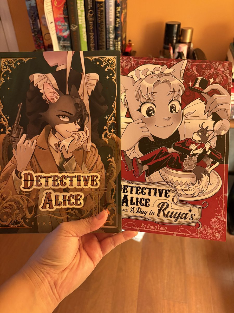 chickenuki's tweet photo. I was so so excited to run to the mail box to pick up my #DetectiveAlice copies!! I immediately sat down and read them with a big grin on my face, thank you so much @kykyyang_ for bringing these characters to life on the page, the books are beautiful! https://t.co/ur8LBmdKqs