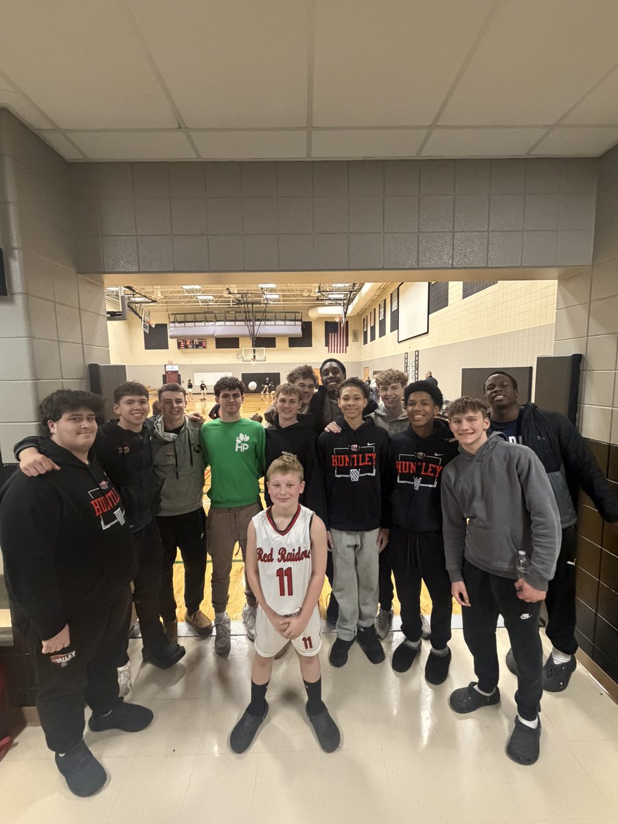 HuntleyHSBball's tweet photo. Huge surprise this morning. Our guys showed up to Calvin’s 9:15 am game and him and his teammates were so pumped! Big shoutout to our captains Aidan Gibbs and Casey Kaczmarski for setting this up. Incredibly grateful to have this group of guys in my kids life. Huntley is the best https://t.co/PvdiFiD06k