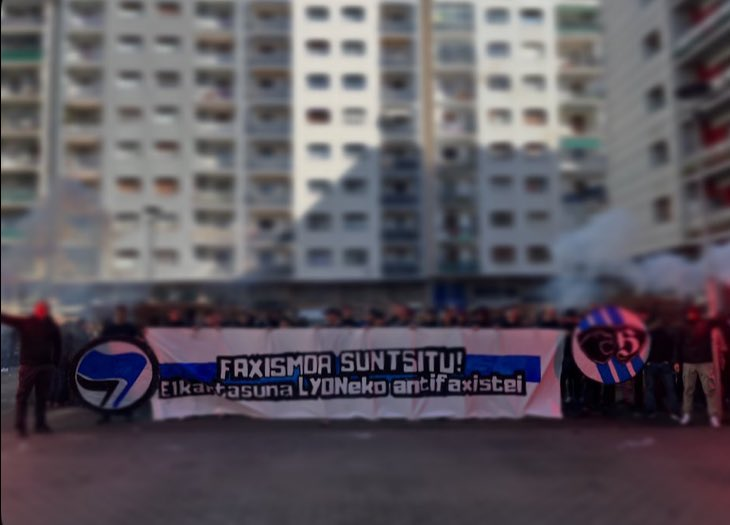 Real Sociedad supporters displayed a banner in solidarity with antifascists in Lyon.