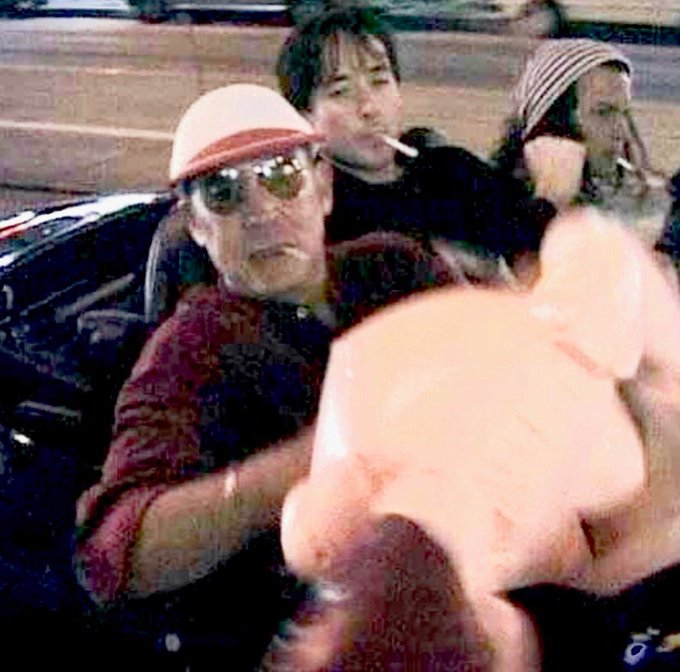 Hunter S. Thompson, John Cusack, and Johnny Depp... and a blow-up doll (mid-1990s)