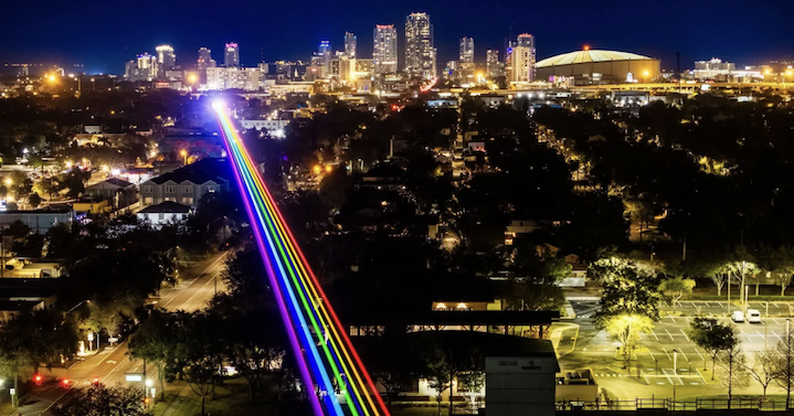 instinctmag's tweet photo. They Took Away the Crosswalk so St. Pete Lit the Sky https://t.co/iSuGYkTFvq #stpetersburg #LGBTQ #Pride #Skyline #WinterPride https://t.co/84guHHfM2S