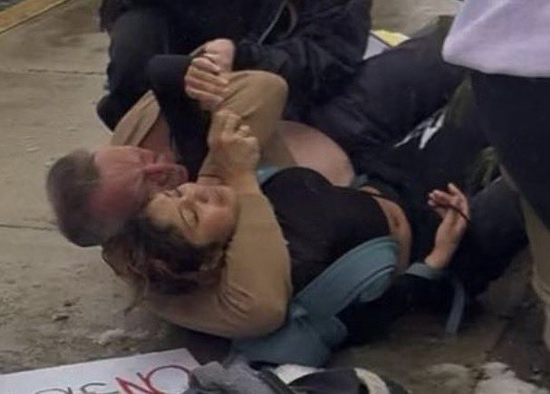 MAGA-Nazi police chief Scott McElree, attempting to choke out a high school girl. This fascist mother of all pussies exemplifies what the MAGA movement is all about.