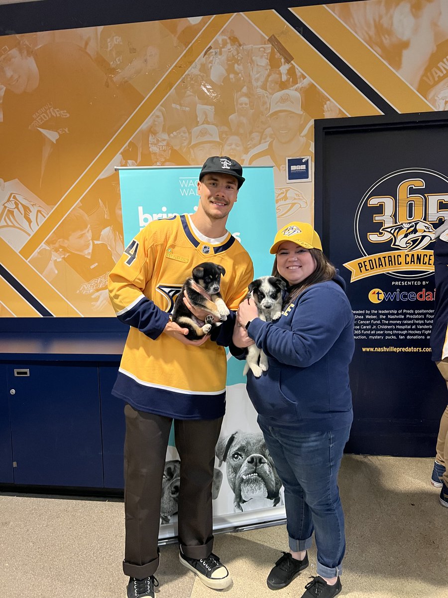 Just me and Olympic bronze medalist, Juuse Saros, with some puppies. 🇫🇮 🥉