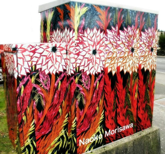 cityofkent's tweet photo. The graphic dahlia flowers that adorn the box across from Kent-Meridian High School on 256th and 101st were originally a wood mosaic by artist Naoko Morisawa. #KentArts https://t.co/f2i6UF8Bgt