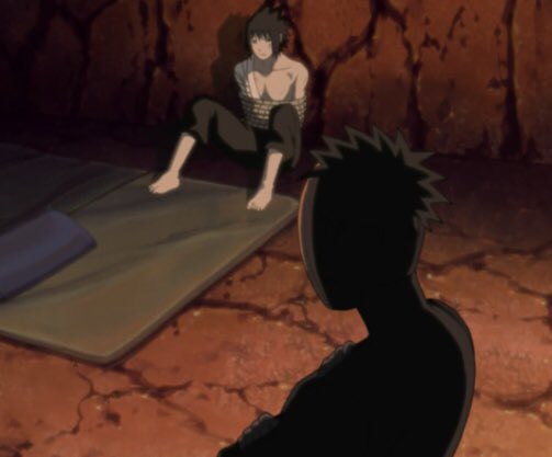 Kakashi and Obito tying Sasuke so he listens