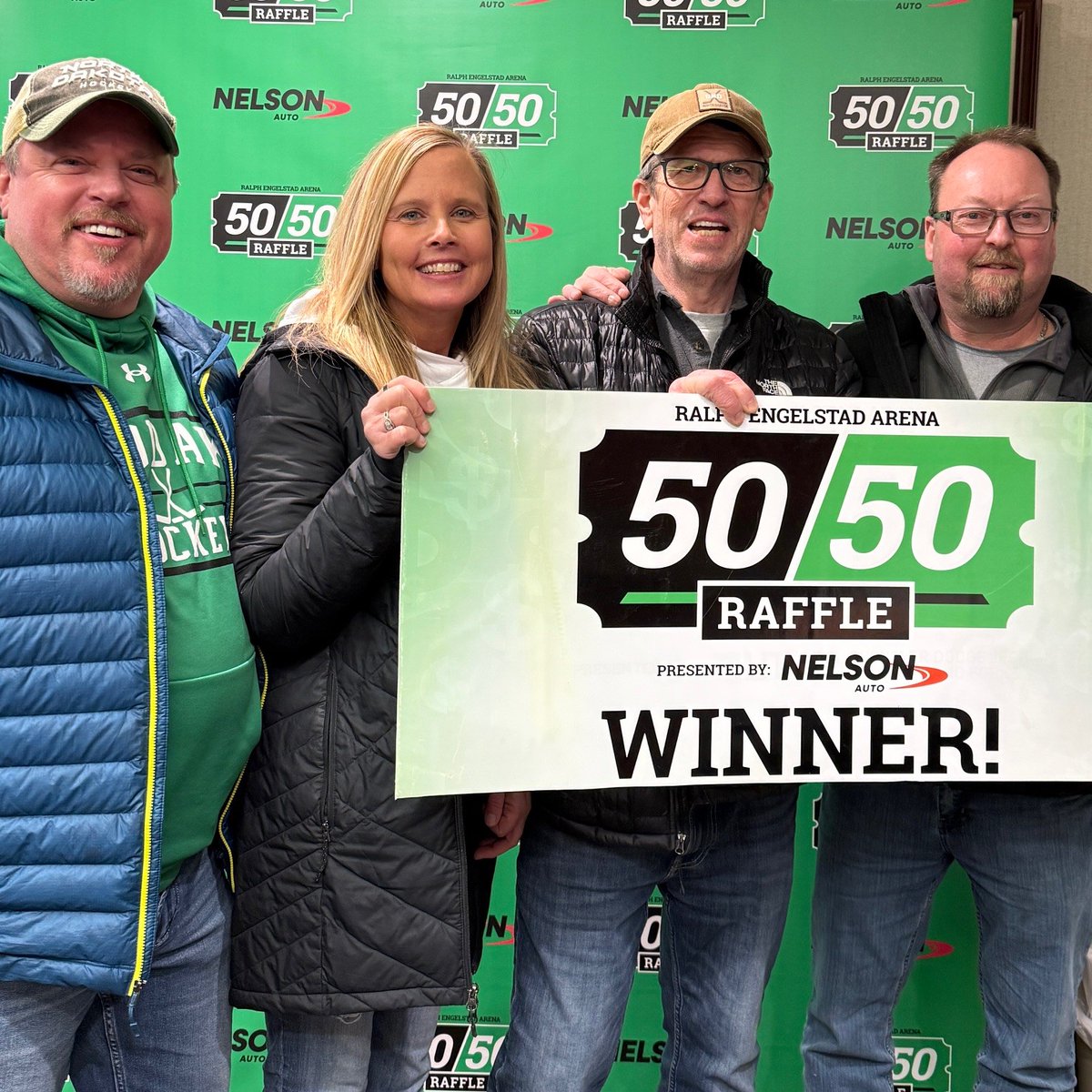 TheREA's tweet image. UND Hockey season ticket holders Derek &amp;amp; Heidi, Chad and Shawn from Grand Forks went in together and won tonight's 50/50 raffle - splitting tonight's jackpot of $61,220!!!! Congrats!

50/50 raffle is sponsored by Nelson Ford &amp;amp; Nelson Chrysler Jeep Dodge Ram of Grand Forks