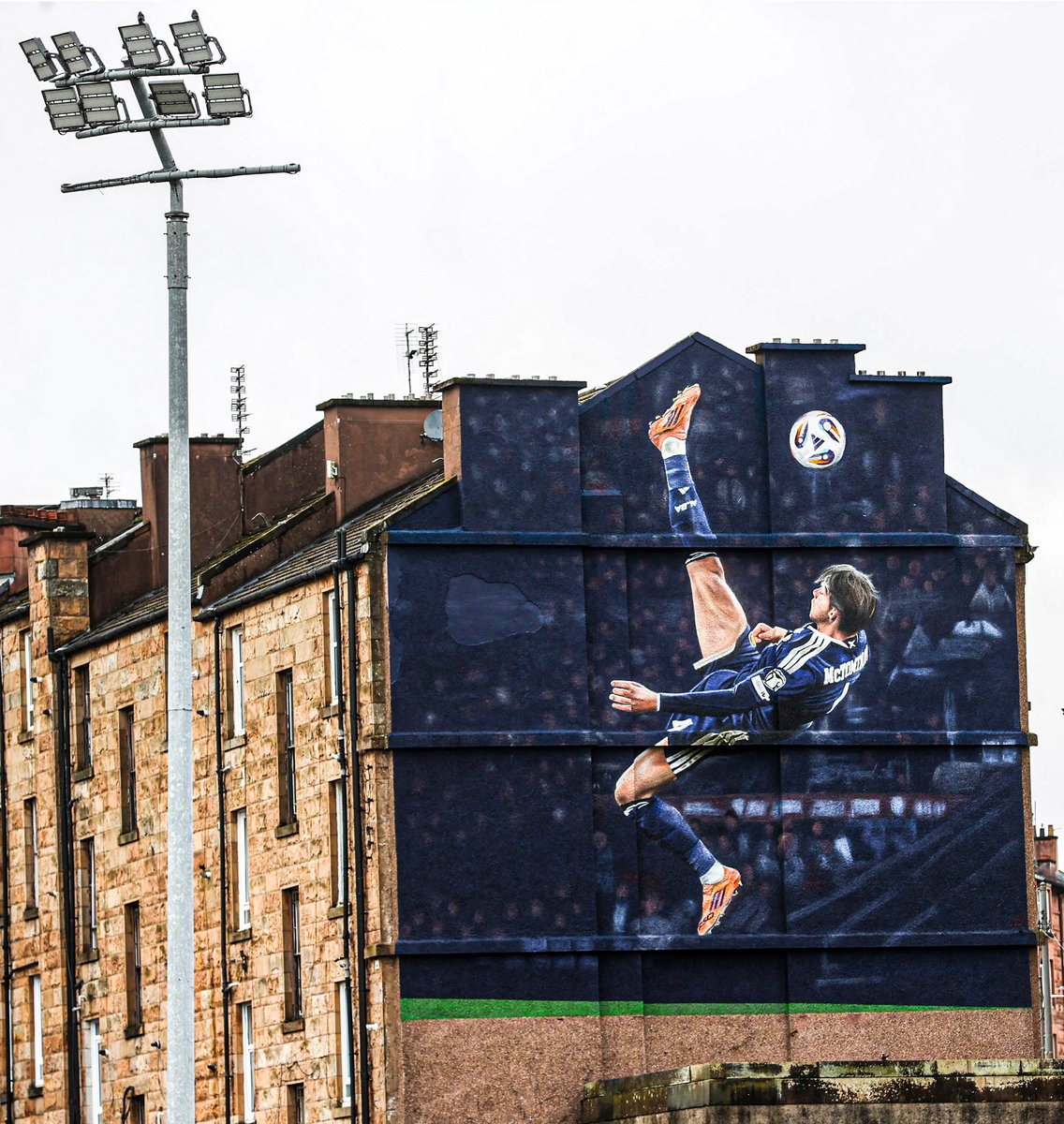 footballontnt's tweet photo. A Scott McTominay mural has been unveiled near Hampden Park to mark THAT overhead kick 🏴󠁧󠁢󠁳󠁣󠁴󠁿 https://t.co/DOGqOEaKdt
