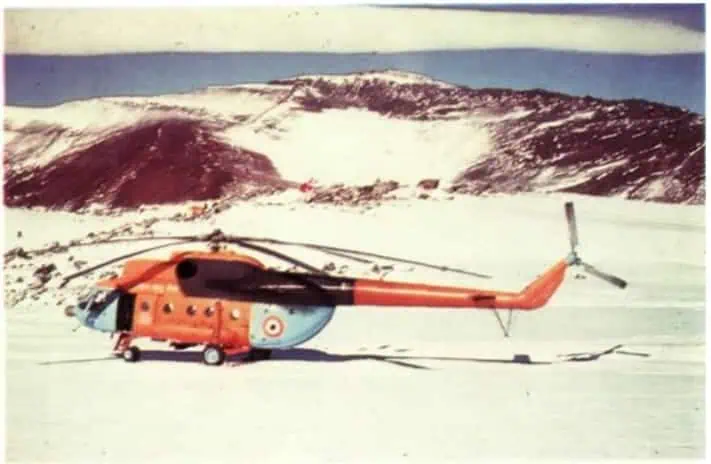 AnchitGupta9's tweet photo. When India went to Antarctica, it went on the shoulders of its airmen. In the 2nd Indian Scientific Expedition in 1983, Sqn Ldr Rajendra Singh Tandon was part of the first IAF team to operate in that unforgiving wilderness. What followed earned him the Shaurya Chakra. 

He volunteered to offload the entire expedition’s equipment from the ship. Over 40 tonnes of material had to be moved quickly before the weather closed in. He worked for more than 24 hours at a stretch, organising and supervising the effort until the last crate was ashore. He ran administration, logistics, coordination. In temperatures well below zero.

He then took on an even greater risk.

On foot and on an open snow scooter, he conducted reconnaissance missions across treacherous terrain to identify a suitable skiway site. Antarctica hides its dangers beneath the surface. Crevasses, deep and invisible, wait beneath deceptively smooth snow. He crossed them repeatedly, fully aware of the risks, to ensure aircraft operations could be established safely. In just ten days, in a landscape hostile to both man and machine, the task was achieved.

Then came the storm.

On the night of 18 Feb 1983, a violent blizzard battered the base camp for two days. Four expedition members were trapped in a damaged hut. Equipment was destroyed. Scientific data, painstakingly gathered, was at risk of being lost forever.

At 0400 hours on 21 Feb, a rescue mission was launched from the ship. The vessel could bring its bow to the ice shelf for only a fleeting window.

Sqn Ldr Tandon  jumped from the ship onto the ice shelf and moved on foot toward the devastated camp. In howling winds and lethal cold, he rescued the trapped members and salvaged vital equipment and precious research data.

The citation speaks of courage and dedication. The reality was resolve under extreme isolation, in a continent where mistakes are unforgiving. What it truly reflected was raw grit.

Indian choppers and their crews formed the backbone of India’s Antarctic mission. But men like Tandon were its spine.

#IAFHistory @IAF_MCC