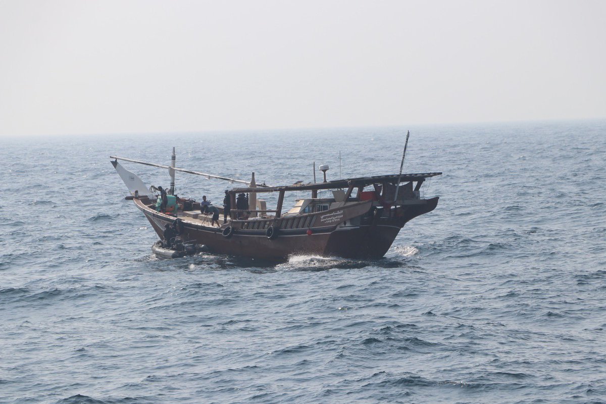 IndiaCoastGuard's tweet image. On 21 Feb 26, @IndiaCoastGuard ship intercepted a suspicious foreign boat inside the #Indian #EEZ, approximately 115 NM west of #Dwarka. The vessel, identified as Al Mukhtar, was manned by four #Iranian crew. On rummaging, 200 cartons containing about one lakh packets of foreign