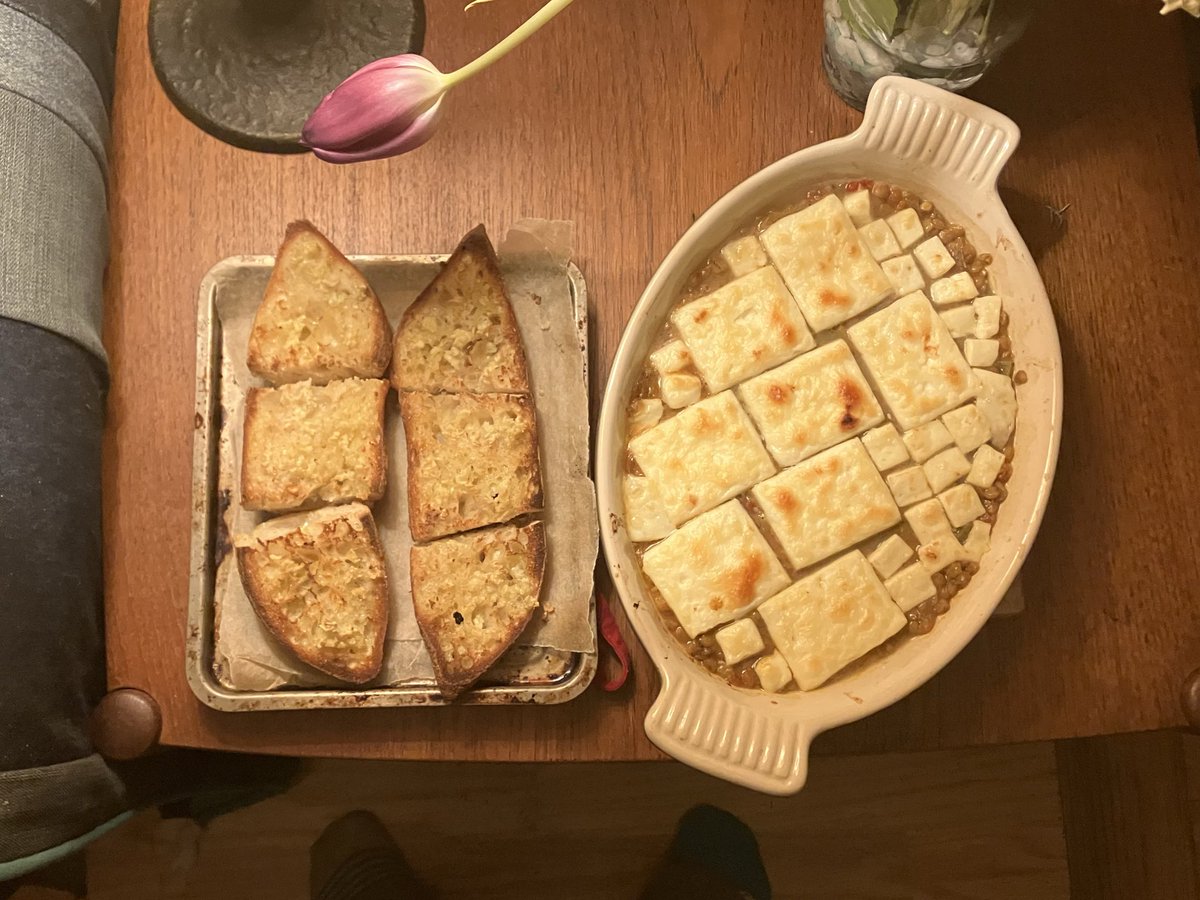 i made baked feta on lentil tomato stew w garlic bread &amp; it was soooo nice, i never tried baking feta before. it doesn’t melt it gets like chewy w a slightly crisp top