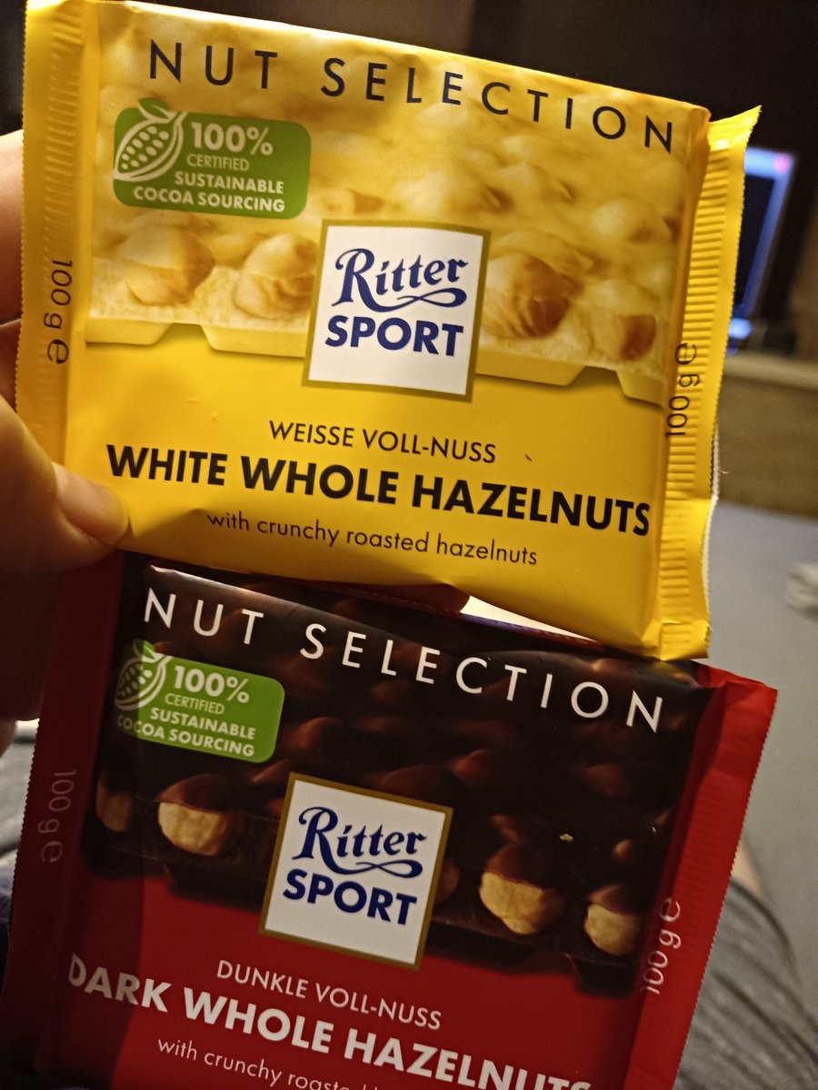 TheKoderZ's tweet image. White Whole Hazelnuts in creamy white chocolate vs. Dark Whole Hazelnuts in rich dark — both loaded with crunchy roasted whole hazelnuts that you can see through the pack.

Snap one off that perfect square and it’s pure bliss. 😋

Fun fact:
Back in 1932, Clara Ritter invented the
