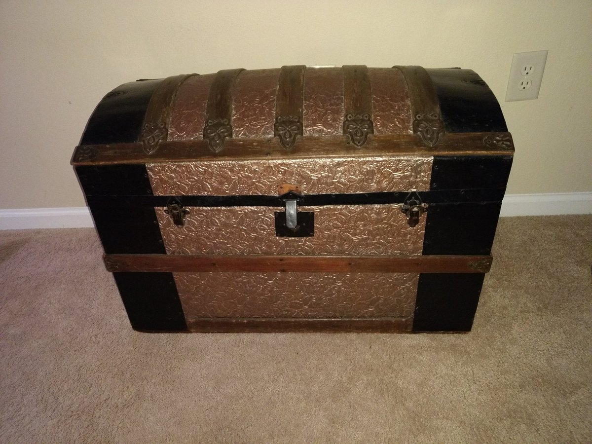 Stripped and refinished this old trunk. Every part had been painted over.