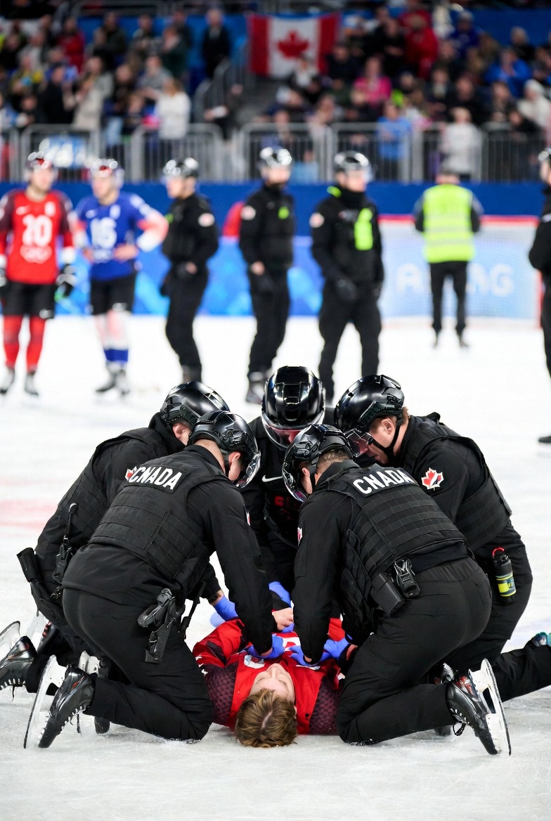BREAKING : Seconds after the winning goal was scored for the USA at the winter olympics in milan , state security services of Canada were on scene delivering life ending care to the canadian olympic team.