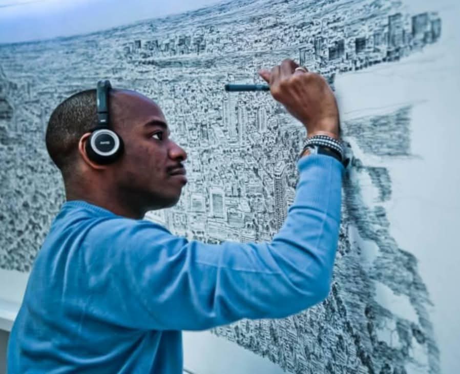 archeohistories's tweet photo. In 1977, doctors gave Stephen Wiltshire a bleak outlook due to his autism, but he soon proved them wrong with his extraordinary talent. After just one helicopter ride, he can draw entire cities from memory with perfect accuracy, including the skylines of London, New York, Rome, Dubai, and Hong Kong.

Stephen Wiltshire’s story only gets more remarkable the deeper you look.

He was diagnosed with autism at age three and didn’t speak until he was five. According to his teachers, one of his first spoken words was “paper.” Drawing wasn’t just a hobby, it was how he processed the world.

By age eight, he had already received his first major commission: the British Prime Minister at the time asked for a drawing of Salisbury Cathedral. At 13, he published his first book of drawings. His panoramic works can take days to complete, often in full public view, where crowds watch him build entire cityscapes from memory, without preliminary sketches or grids.

In 2006, he was awarded an MBE at Buckingham Palace for his contributions to art. Today, his work is permanently displayed in galleries, and he has created detailed skyline commissions for cities across five continents.

Neuroscientists have studied his abilities as an example of “savant syndrome,” a rare condition affecting roughly 1 in 10 people with autism—making his level of precision extraordinarily uncommon.

© Reddit

#archaeohistories