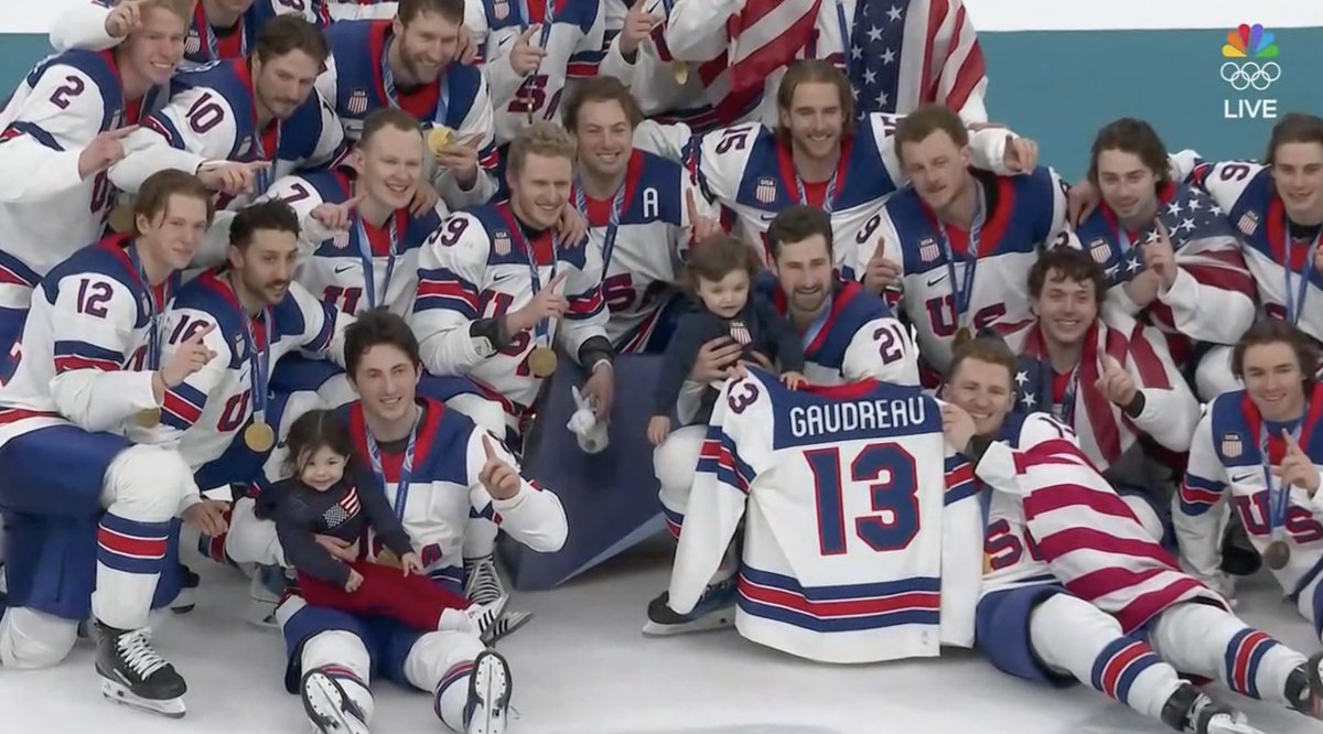 espn's tweet image. Zach Werenski and Dylan Larkin brought Johnny Gaudreau's children on the ice for their gold medal photo ❤️ 🥇