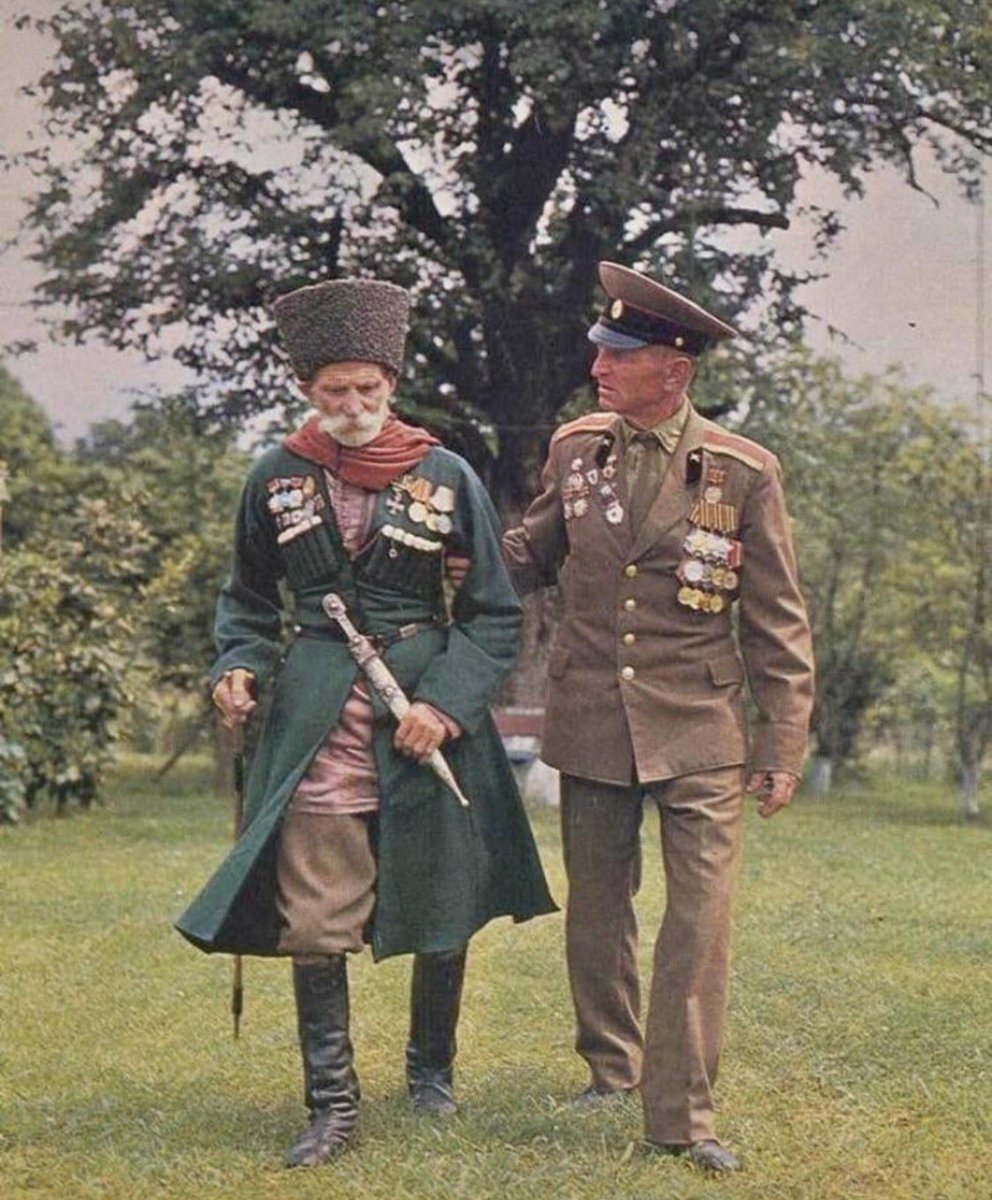 112 year-old Teimruz Vanacha (left, veteran of WWI and the Russian Civil War, with his son Ivan, a veteran of WWII, in 1980
