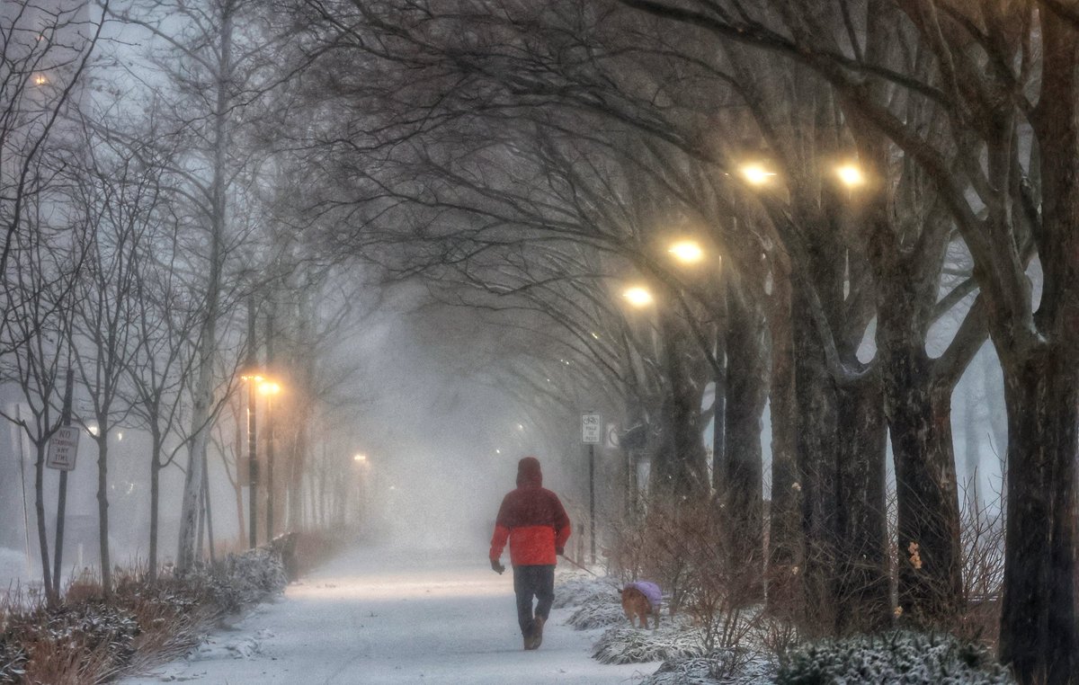 GaryHershorn's tweet image. People out and about as the blizzard begins in Hoboken, NJ, Sunday evening #hoboken #snow #blizzard