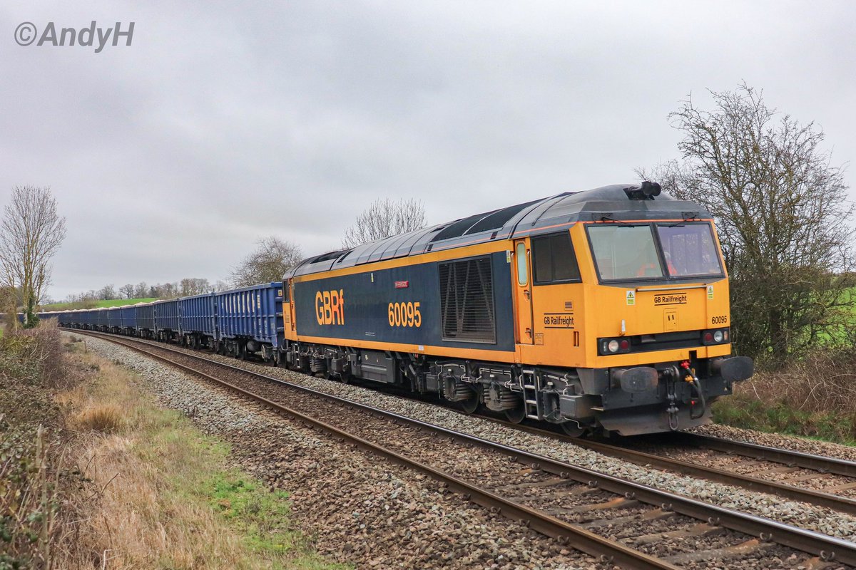 holtona72's tweet image. Cloudy skies meant the #SaturdaySandTrain shot at Wing was possible this week. Hired-in #GBRF tug 60095 'Whernside' makes an impressive sight &amp;amp; sound hauling @DCRailOfficial 6M89 Middleton Towers to Chaddesden Sidings through the #Rutland countryside at lunchtime today. 7/3/26
