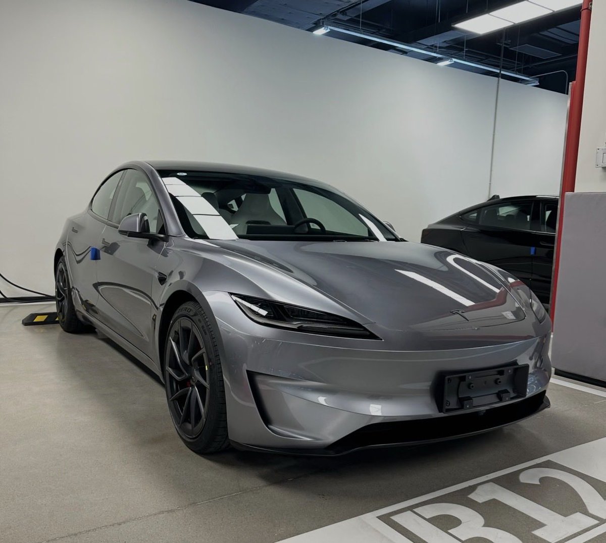 The Tesla Newswire tweet media