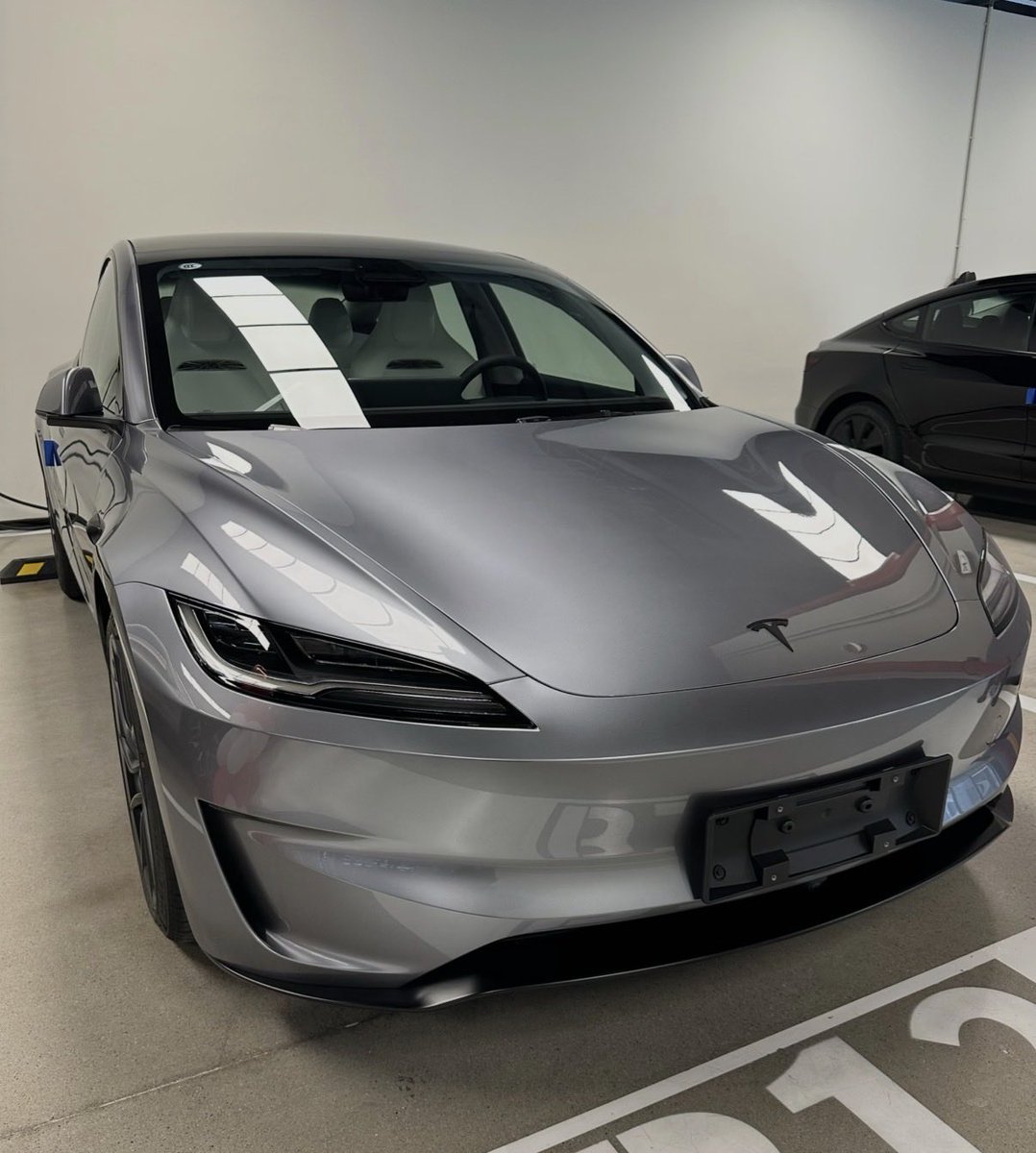 The Tesla Newswire tweet media