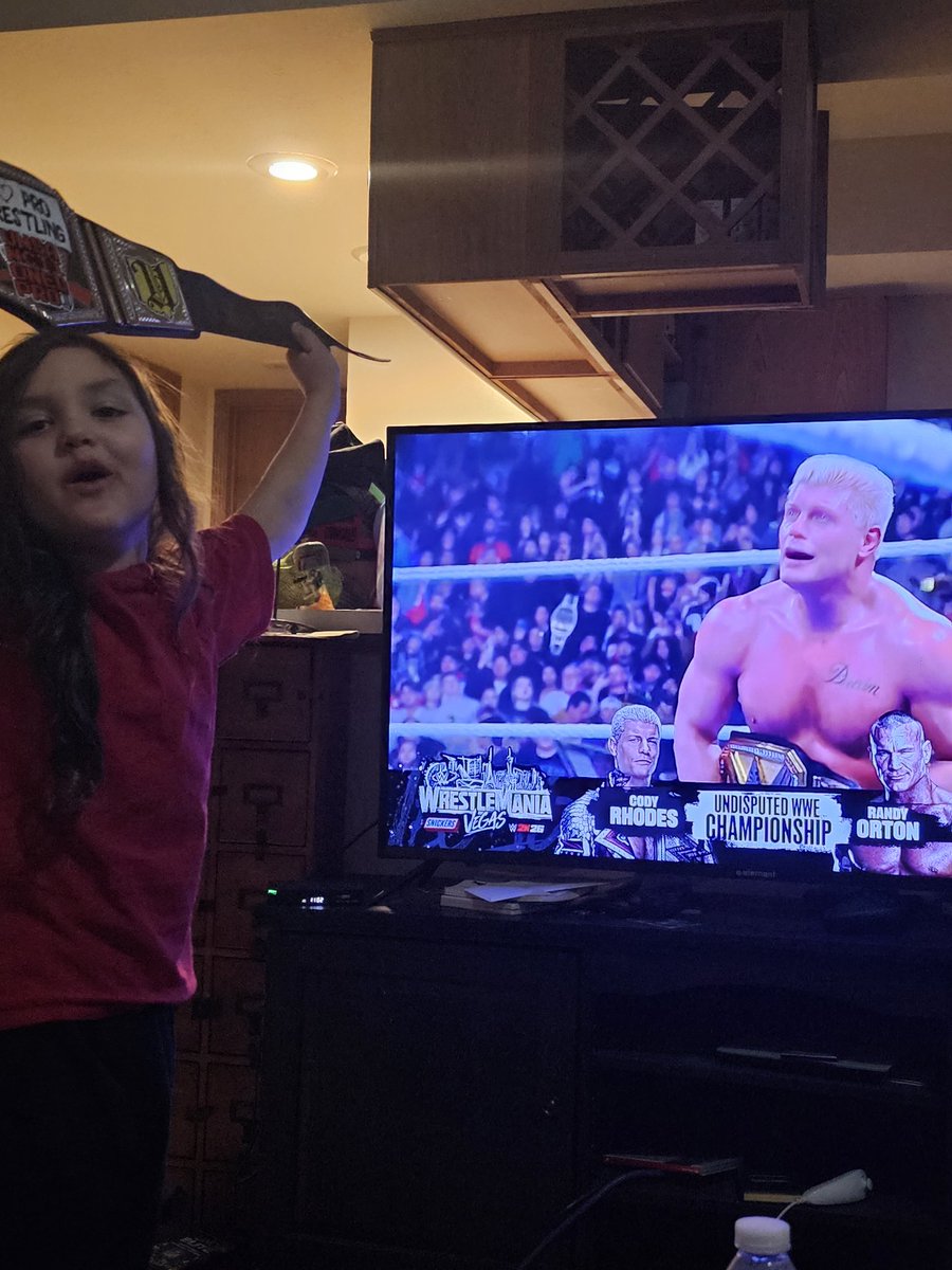 koller9999's tweet photo. Core memories being made. I ❤️ Pro Wrestling! My dad took me to my 1st show when I was 6 years old. Now at 50, i've had the honor to pass it down to 2 generations. This may look like a pic of a TV but for the grandkid, it was a personal moment between him &amp; his hero @CodyRhodes https://t.co/pUvj0kALXh