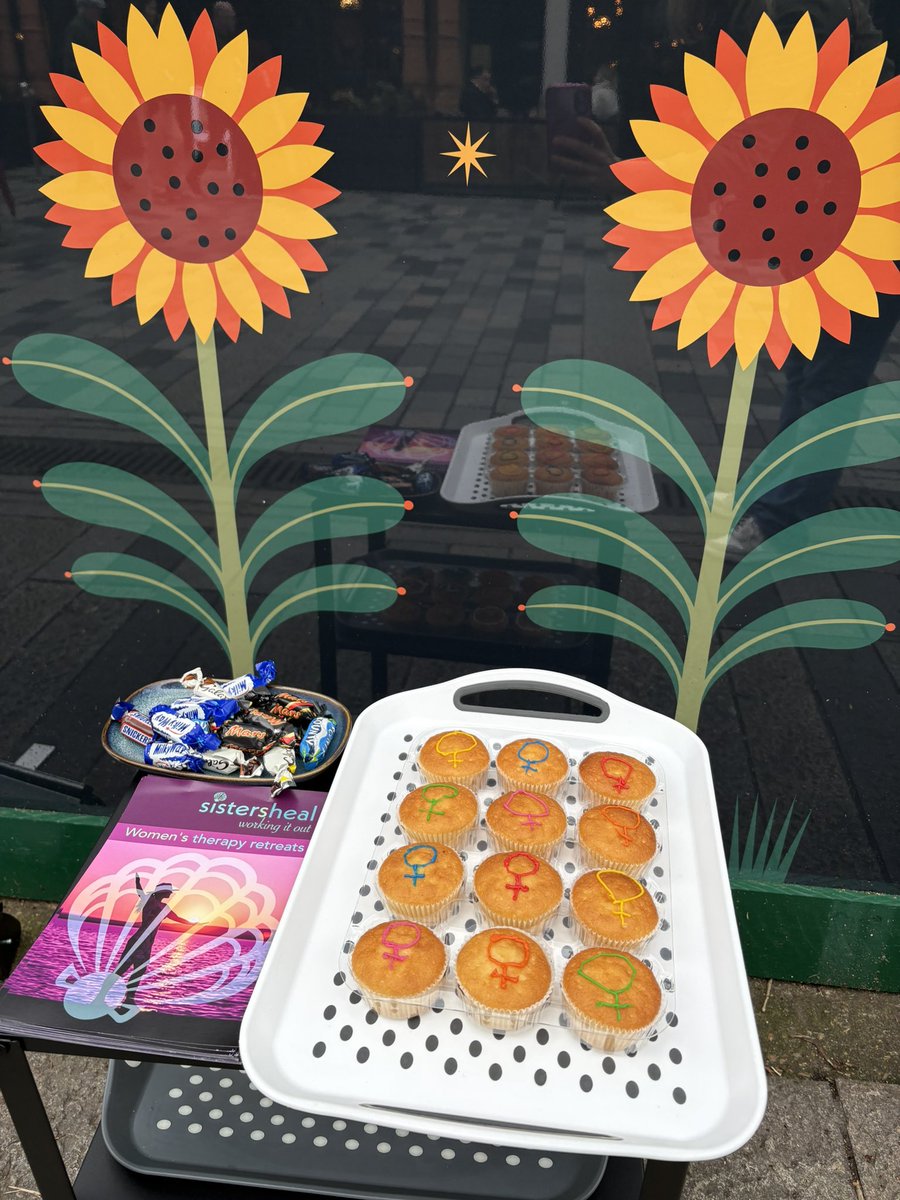 sisters_heal's tweet photo. The IWD2026 celebrations continue with Cupcakes! Designed by one of our daughters 🧁❤️ We’re out in Brighton on New Road opposite the Theatre Royal. Get a cupcake in exchange for a donation to our solidarity fund ❤️ https://t.co/l9TcrcHl8k