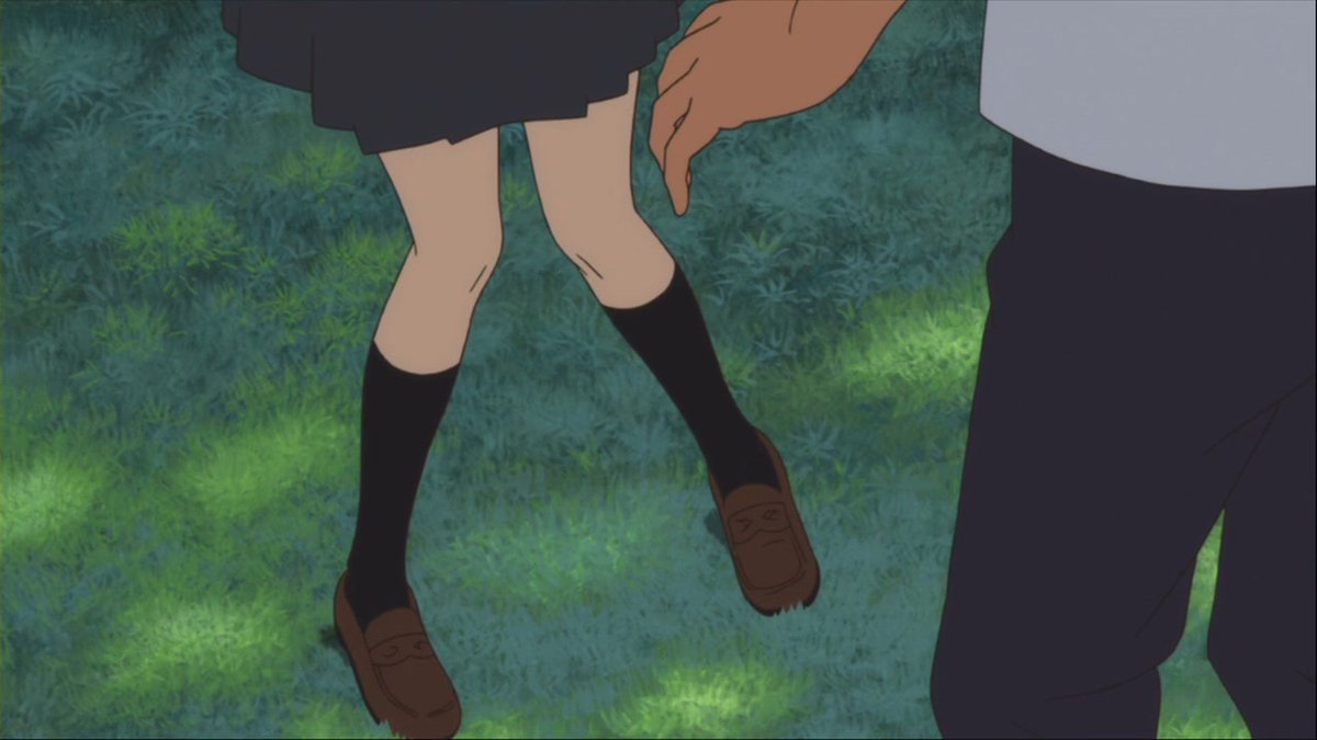 Ses traits doux et son regard assure donnent vie a la photo, la rendant chaleureuse et captivante.