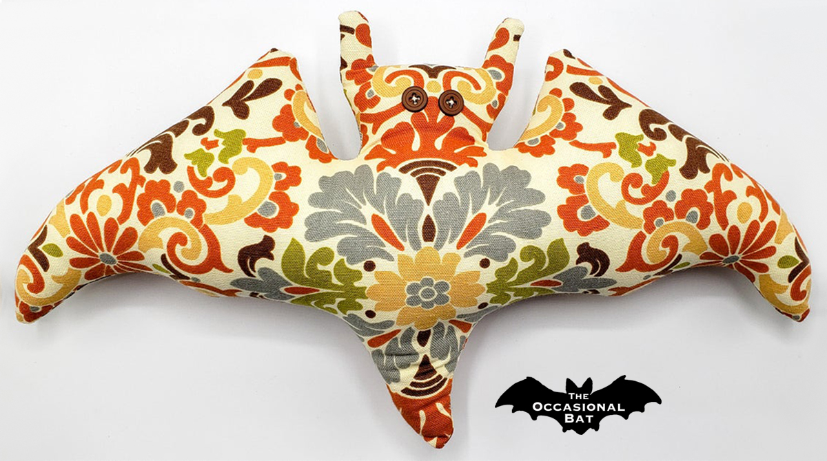 OccasionalBat's tweet photo. Blooming with joy, this stunning floral bat pillow in ivory, orange, green, yellow, and grey is a feast for the eyes! Brighten your day with these vibrant colors! #FloralArt #ColorJoy #TheOccasionalBat #Handmade #BatShapedPillow #Baturday 🧡🩶💛 https://t.co/tcy2ZIzTiz https://t.co/hJYe71KWFh