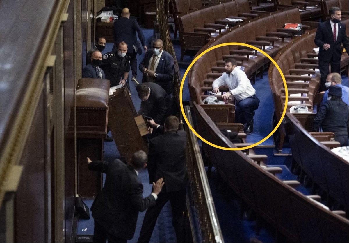 There are a lot of posts out there with the close-up visual of Markwayne Mullin at the Capitol on January 6, but I think this is a better perspective.

It shows that he is not protecting others; he’s protecting himself and hiding. You can see plenty of people at the entry door,