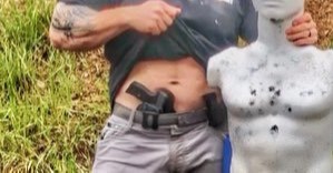 Pulling a <a href="/baroncoleman/">Baron Coleman</a> here: I've clipped this pic to hide the identify of the person so as not to let personal bias affect your opinion.   
 
But, shoving a gun down your pants... this is cool right? Asking seriously. Sorta.

Maybe I am just trolling.