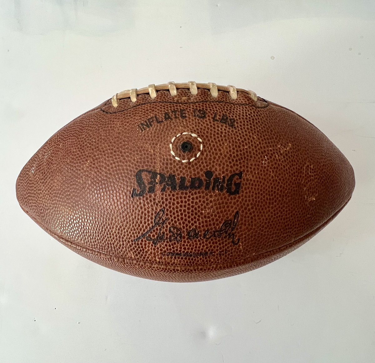 Stampeders1945's tweet photo. Remembering the Spalding JFV football, used in Canadian football games from the 1940s, and in the CFL 1958-95 until replaced by the Wilson ball. This promotional ad comes from the 1958 Grey Cup program, showing the ball with Commissioner Sydney Halter’s signature. 🇨🇦🏈 https://t.co/eAt4bLMWJB