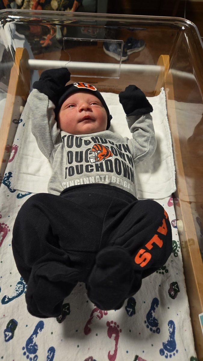 Austinspann2's tweet photo. Welcoming our newest @Bengals fan! Pretty sure he was thinking "TOUCHDOWN @teehiggins5" 
Bellamy king spann will be ready for next season! https://t.co/1o3e5efhUy