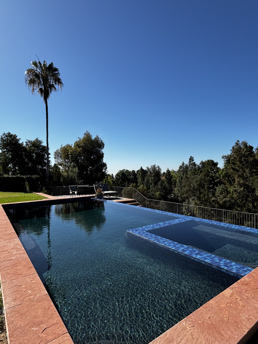 Dark PebbleTec can completely transform the look of a pool. The deeper color gives the water a rich, elegant tone and creates that upscale resort-style appearance many homeowners love. If you want a pool project that feels sleek, modern, and timeless. ✨🏊
