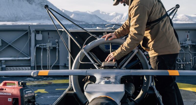 Drone_Wars_'s tweet photo. Shield AI tested its V-BAT VTOL UAV in Arctic conditions during NATO exercise HEIMDALL 26 in Norway. The drone operated day & night from the Norwegian Coast Guard ship KV Olav Tryggvason and ground sites. #VBAT #ShieldAI #NATO #ArcticOps #UAV https://t.co/wGyURFjnXo