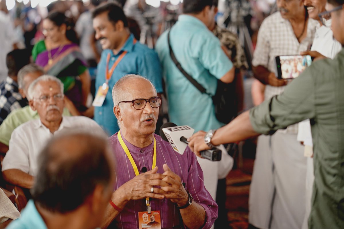kannurjo's tweet photo. A great behind-the-scenes. Here is my  friend Sandeep Kannadipparamba covering the Mega Adalath at Kannur for ANI, capturing Rajya Sabha MP C. Sadanandan Master's interaction with the media. Keep up the excellent work!"#MegaAdalath #Kerala #ANI #bjp4keralam https://t.co/wgTRMlF0cX