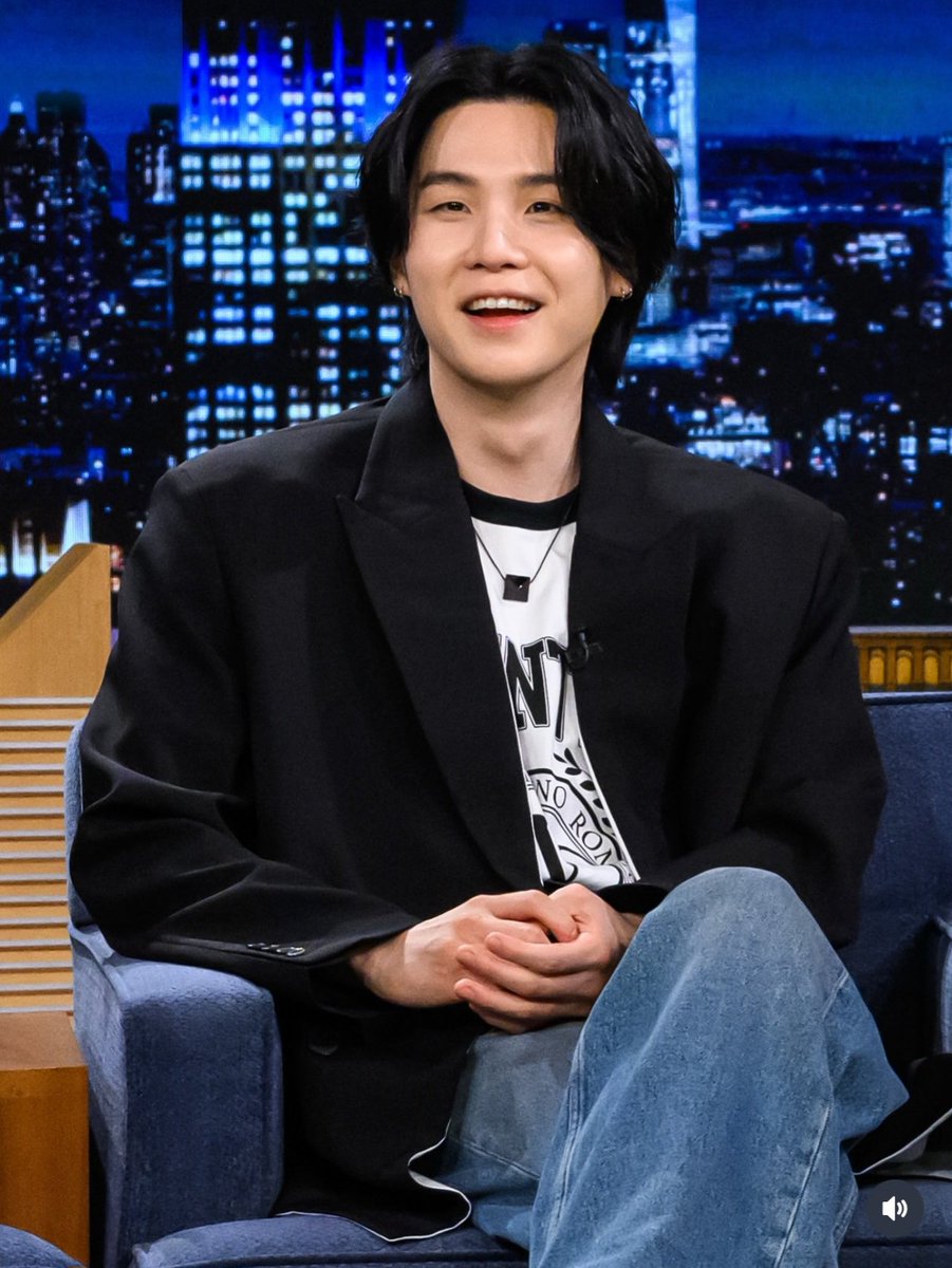DataAgustD's tweet photo. The Tonight Show photographer Todd Owyoung wished Yoongi a happy birthday on Instagram with a “Shining With SUGA” message. 😭🎂💗

“Happy birthday, @/agustd! I hope all of ARMY is Shining with SUGA in celebration.

Here are two of my favorite photos from SUGA’s solo appearance on the Tonight Show during his interview and the Imposter Challenge. I liked that both of these photos show SUGA smiling as he looked out.

In the first photo, Jimmy mentions SUGA’s documentary, Road to D-Day that was released on Netflix, asking him if he was used to the cameras being around for such a production. SUGA laughs and remarks that he’s done many documentaries, and that he doesn’t feel uncomfortable around cameras. Then he points out that there are many cameras in front of him in that moment. The moment of this photo occurs at exactly the 6:00 mark in the full interview on YouTube.

I hope SUGA and all the boys are getting some rest before their world tour. And that ARMY is also getting some rest ahead of the excitement of the new reunion. Happy birthday, SUGA.”

HAPPY SUGA DAY
SHINING WITH SUGA
#SUGA #AgustD #MinMarch2026