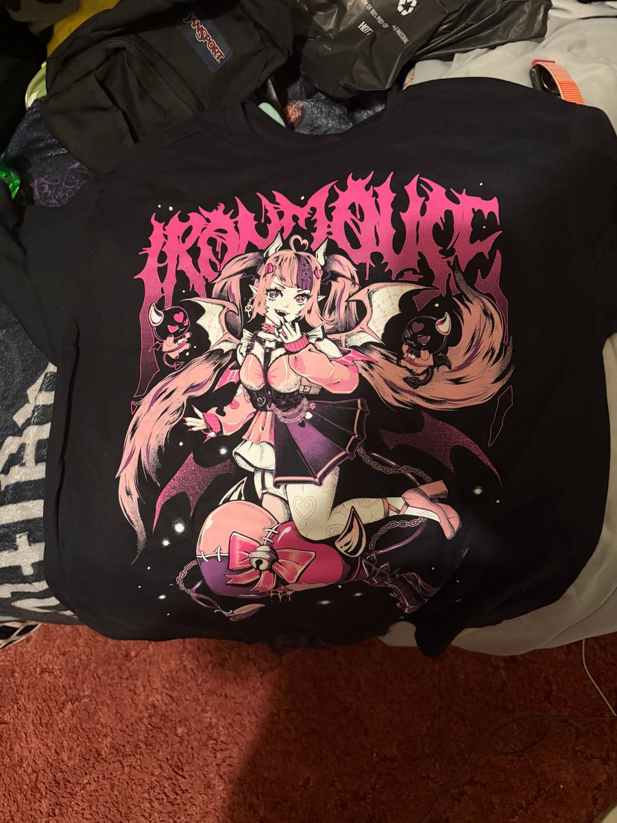 wwe_master1's tweet photo. So I just visited #RosspParkMall tonight and I found this in @HotTopic I didn't know that @ironmouse had her shirt there, but I'm glad I found it. 😁😁😁 https://t.co/NFuVK7XUe4