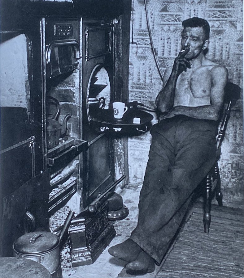 Durham miner home after working at least 10 hours straight, 1937. A brief moment of leisure. Men like this built England. The Anglo ruling class has sided with African migrants, not the descendants of this man.